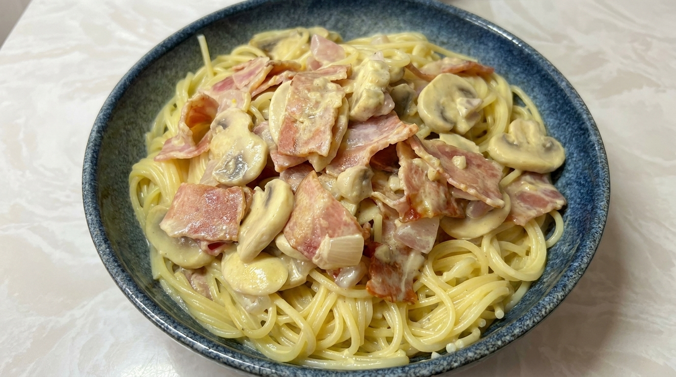 Spaghetti crémeux au bacon et aux champignons