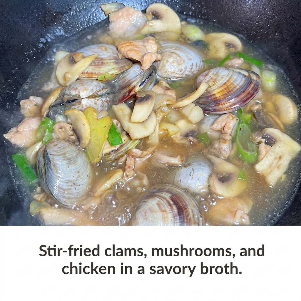 Pâte de soja incorporée dans le bouillon frémissant avec les palourdes et les légumes.