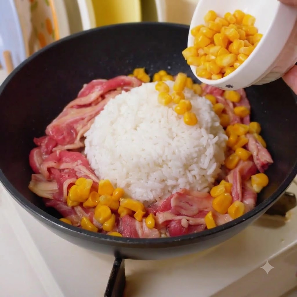 Grains de maïs jaunes versés dun petit bol autour du bœuf et du riz.