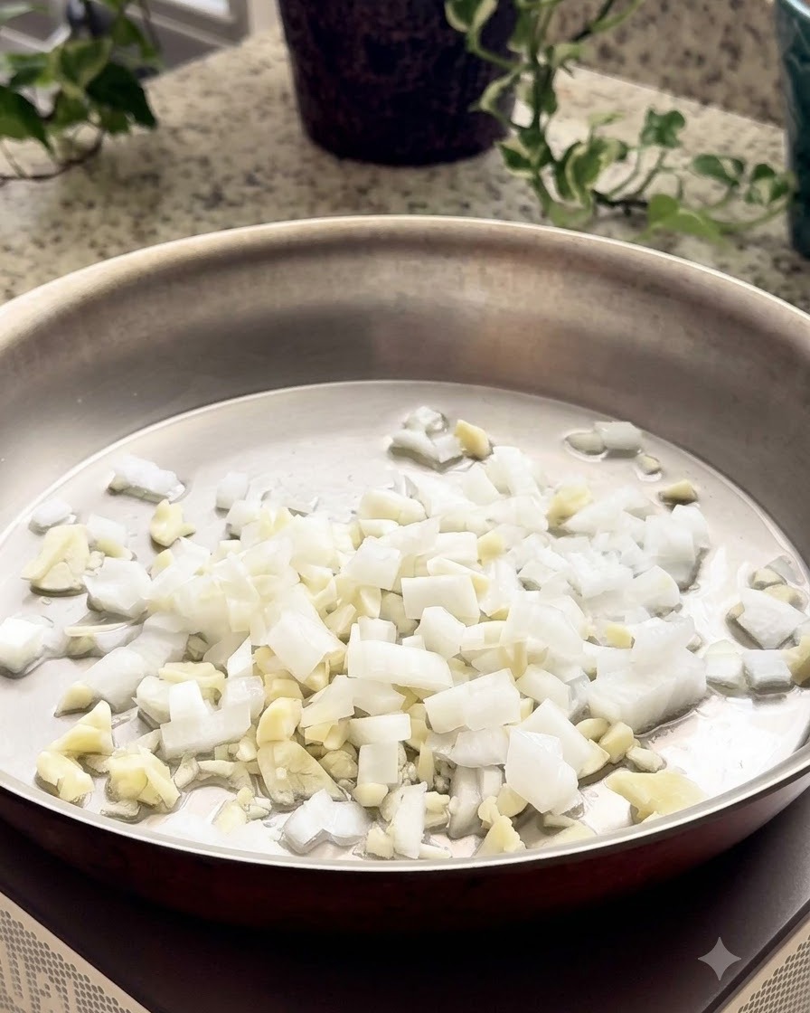 Des flocons de piment saupoudrés dans une poêle contenant les oignons, lail et le brocoli.