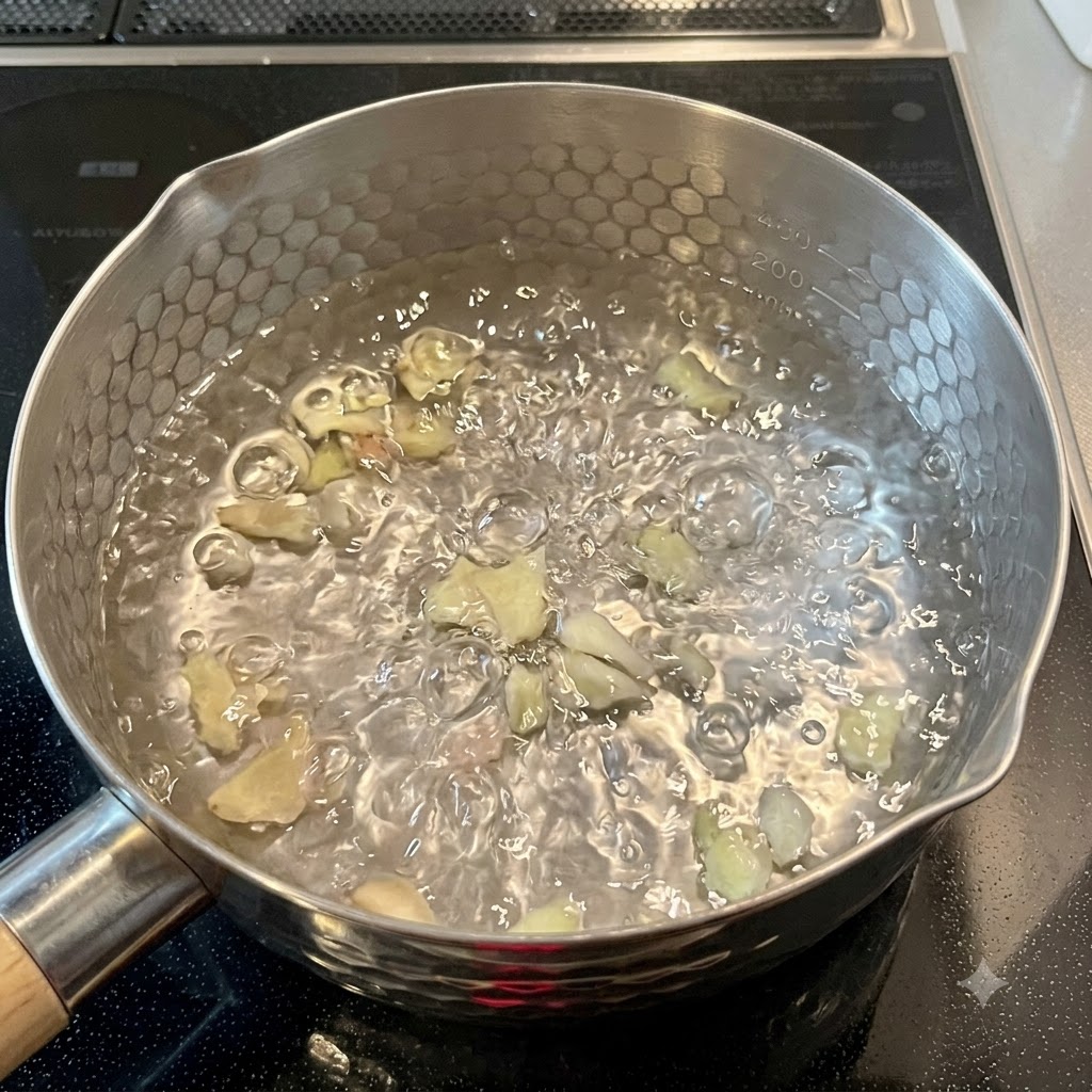 Des nouilles sèches en train de cuire dans une casserole deau bouillante bouillonnante sur la cuisinière.
