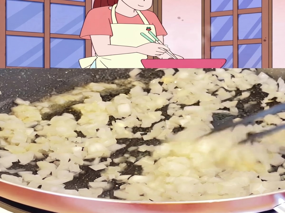 Des oignons coupés en dés cuisant et grésillant dans une poêle jusquà devenir tendres et légèrement translucides.
